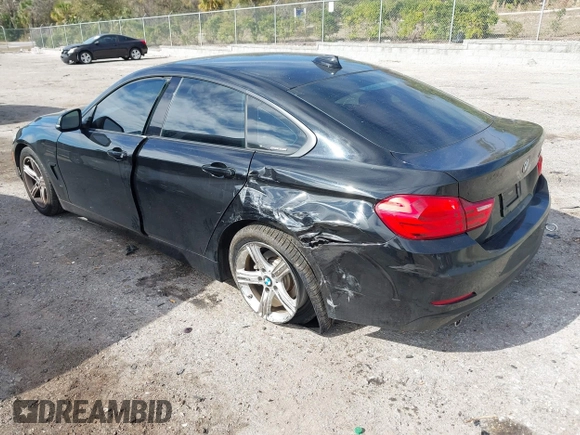 2015 BMW 4 Series 428i z VIN WBA4A9C58FGL85170, wystawiony jako IAAI lot #41362595 z przebiegiem 172 509 mil mil oraz . Historia ofert i sprzedaży dostępna na DreamBid. Obrazek 3.