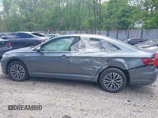 2019 Volkswagen Jetta S z VIN 3VWC57BUXKM121316, wystawiony jako IAAI lot #42290107 z przebiegiem 117 371 mil mil oraz . Historia ofert i sprzedaży dostępna na DreamBid. Obrazek 15.