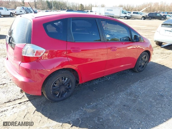 2009 Honda Fit with VIN JHMGE88219S036655, listed as a IAAI auction lot 41879820 with 209,454 mi miles. Bid and sale history available at carsss.com. Image 4.
