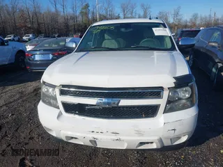 2007 Chevrolet Suburban LTZ with VIN 3GNFK16347G200999, listed as a IAAI auction lot 41392205 with 115,656 mi miles. Bid and sale history available at carsss.com. Image 12.