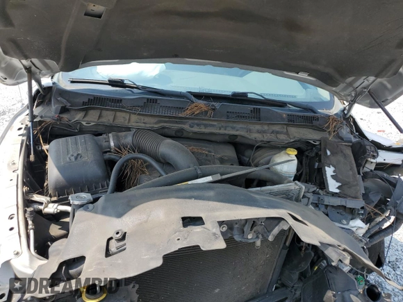 2013 Ram 1500 Tradesman z VIN 1C6RR7ST5DS710722, wystawiony jako Copart lot #58982445 z przebiegiem 141 919 mil mil oraz Szkoda całkowita • Salvage title. Historia ofert i sprzedaży dostępna na DreamBid. Obrazek 11.