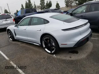 2021 Porsche Taycan 4S z VIN WP0AB2Y15MSA44483, wystawiony jako Copart lot #44510623 z przebiegiem 27 812 mil mil oraz . Historia ofert i sprzedaży dostępna na DreamBid. Obrazek 2.