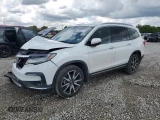 2021 Honda Pilot Touring 7-Passenger z VIN 5FNYF6H66MB005885, wystawiony jako Copart lot #56560175 z przebiegiem Nie podano mil oraz Szkoda całkowita • Salvage title. Historia ofert i sprzedaży dostępna na DreamBid. Obrazek 1.
