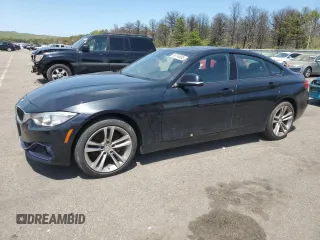 2015 BMW 4 Series 428i xDrive with VIN WBA4C9C56FD331197, listed as a Copart auction lot 56714895 with 126,386 mi miles and Clean title. Bid and sale history available at DreamBid. Image 1.