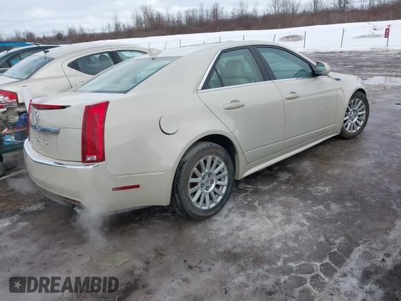 2010 Cadillac CTS Luxury with VIN 1G6DG5EG2A0109533, listed as a IAAI auction lot 41659590 with 110,749 mi miles and . Bid and sale history available at DreamBid. Image 4.