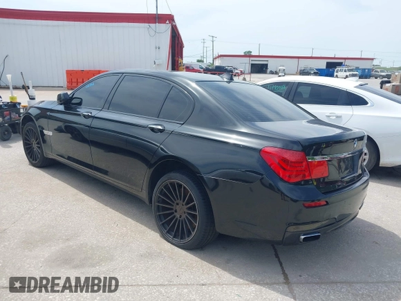 2011 BMW 7 Series 750Li with VIN WBAKB8C55BC852304, listed as a IAAI auction lot 42017467 with 116,530 mi miles. Bid and sale history available at carsss.com. Image 3.