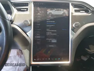 2014 Tesla Model S 60 z VIN 5YJSA1H11EFP43395, wystawiony jako Copart lot #54653845 z przebiegiem 120 180 mil mil oraz Szkoda całkowita • Salvage title. Historia ofert i sprzedaży dostępna na DreamBid. Obrazek 9.