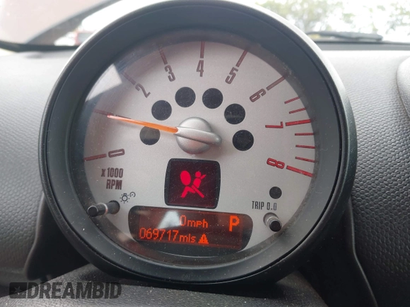 2014 MINI Countryman with VIN WMWZB3C51EWR36737, listed as a IAAI auction lot 41741248 with 69,717 mi miles and . Bid and sale history available at DreamBid. Image 7.