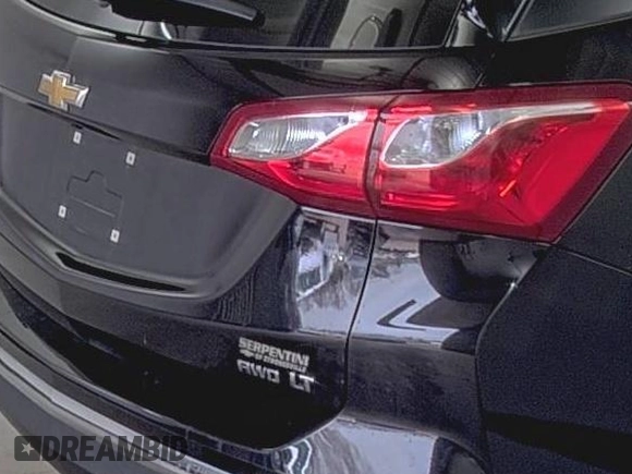 2019 Chevrolet Equinox LT z VIN 2GNAXTEV2K6259533, wystawiony jako IAAI lot #42556128 z przebiegiem 91 907 mil mil oraz . Historia ofert i sprzedaży dostępna na DreamBid. Obrazek 19.