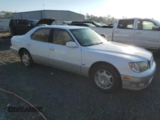 2000 Lexus LS 400 z VIN JT8BH28F0Y0175297, wystawiony jako Copart lot #75230834 z przebiegiem 293 851 mil mil oraz Szkoda całkowita • Salvage title. Historia ofert i sprzedaży dostępna na DreamBid. Obrazek 4.