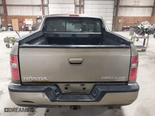 2011 Honda Ridgeline RTS with VIN 5FPYK1F4XBB008020, listed as a IAAI auction lot 41817310 with 227,803 mi miles. Bid and sale history available at carsss.com. Image 16.