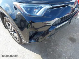 2018 Toyota RAV4 LE with VIN 2T3ZFREVXJW457751, listed as a IAAI auction lot 41529251 with 230,054 mi miles. Bid and sale history available at carsss.com. Image 19.