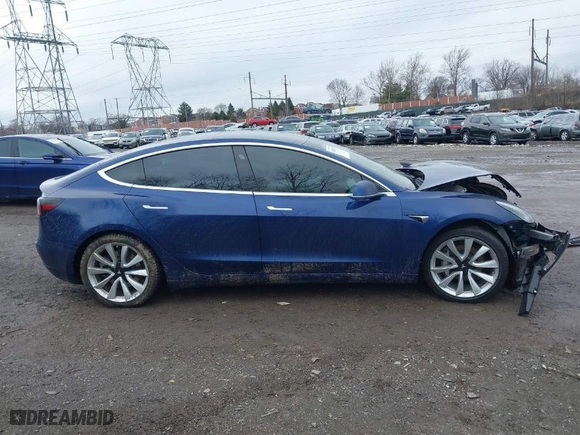 2019 Tesla Model 3 Mid Range with VIN 5YJ3E1EA6KF332812, listed as a IAAI auction lot 41586157 with 80,230 mi miles. Bid and sale history available at carsss.com. Image 13.