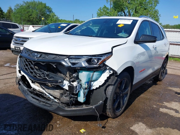 2021 Chevrolet Equinox Premier z VIN 2GNAXNEV9M6120241, wystawiony jako IAAI lot #42222928 z przebiegiem 104 274 mil mil oraz . Historia ofert i sprzedaży dostępna na DreamBid. Obrazek 19.