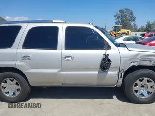 2005 Cadillac Escalade z VIN 1GYEC63N65R249827, wystawiony jako IAAI lot #42247650 z przebiegiem 254 052 mil mil oraz . Historia ofert i sprzedaży dostępna na DreamBid. Obrazek 14.