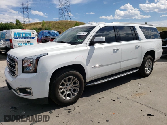 2019 GMC Yukon XL SLT with VIN 1GKS2GKC5KR362816, listed as a Copart auction lot 69062794 with 96,321 mi miles and Salvage Title. Bid and sale history available at DreamBid. Image 1.