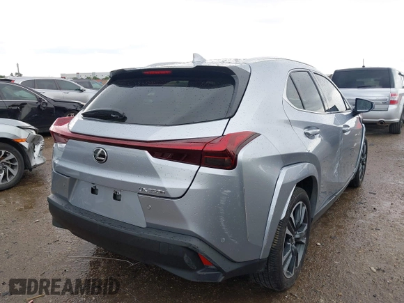 2024 Lexus UX 250h Premium z VIN JTHP6JBH7R2193351, wystawiony jako IAAI lot #42172680 z przebiegiem 10 072 mil mil oraz . Historia ofert i sprzedaży dostępna na DreamBid. Obrazek 4.