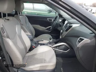 2013 Hyundai Veloster w/Black Int with VIN KMHTC6AD8DU155575, listed as a IAAI auction lot 41722849 with 100,204 mi miles and . Bid and sale history available at DreamBid. Image 5.
