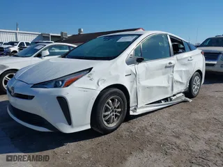 2022 Toyota Prius L Eco with VIN JTDKAMFUXN3163123, listed as a IAAI auction lot 41666679 with 68,026 mi miles. Bid and sale history available at carsss.com. Image 20.