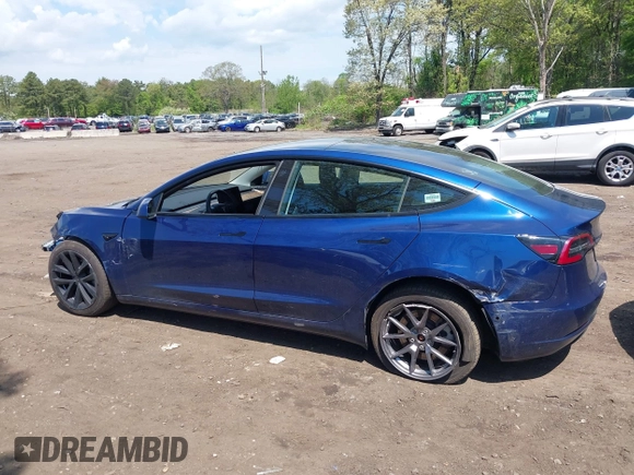 2022 Tesla Model 3 Long Range z VIN 5YJ3E1EB7NF180049, wystawiony jako IAAI lot #42188963 z przebiegiem 18 604 mil mil oraz . Historia ofert i sprzedaży dostępna na DreamBid. Obrazek 14.