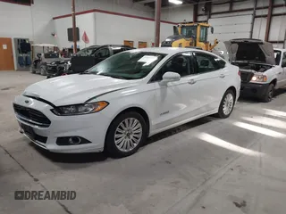 2013 Ford Fusion SE Hybrid with VIN 3FA6P0LU7DR254983, listed as a IAAI auction lot 41883531 with 188,585 mi miles and . Bid and sale history available at carsss.com. Image 2.