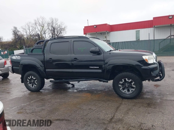 2015 Toyota Tacoma with VIN 3TMLU4ENXFM185371, listed as a IAAI auction lot 41952513 with 87,128 mi miles and . Bid and sale history available at DreamBid. Image 13.