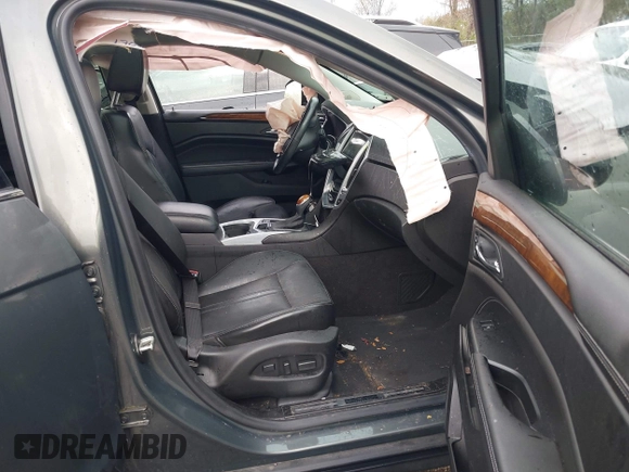 2013 Cadillac SRX Luxury Collection z VIN 3GYFNCE34DS550410, wystawiony jako IAAI lot #41917636 z przebiegiem 66 437 mil mil oraz . Historia ofert i sprzedaży dostępna na DreamBid. Obrazek 5.