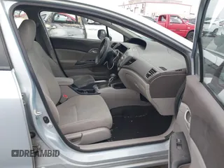 2012 Honda Civic LX with VIN 2HGFB2F58CH560126, listed as a IAAI auction lot 42097094 with 149,921 mi miles and . Bid and sale history available at DreamBid. Image 5.