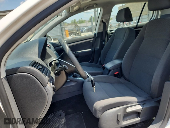 2009 Volkswagen Rabbit S with VIN WVWDB71K79W120196, listed as a Copart auction lot 62126625 with 105,695 mi miles and Salvage title. Bid and sale history available at DreamBid. Image 7.