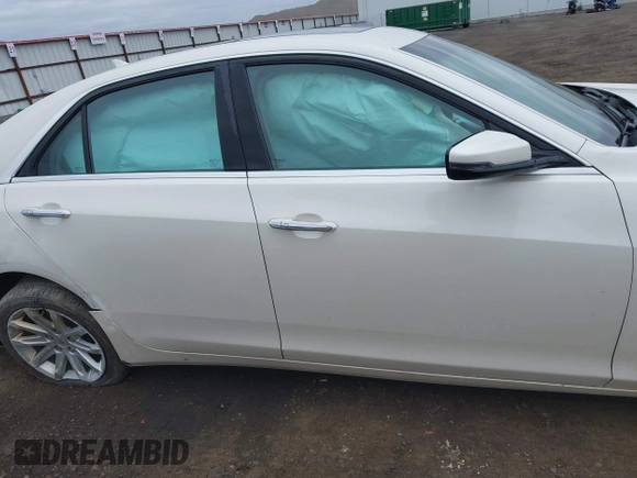 2014 Cadillac CTS Luxury AWD with VIN 1G6AX5S3XE0184524, listed as a IAAI auction lot 42260852 with 139,667 mi miles and . Bid and sale history available at DreamBid. Image 13.