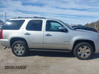 2011 GMC Yukon SLT with VIN 1GKS2CE01BR186874, listed as a IAAI auction lot 41762705 with 249,283 mi miles. Bid and sale history available at carsss.com. Image 13.
