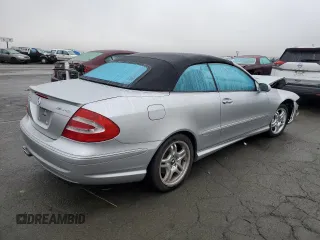 2004 Mercedes-Benz CLK 55 AMG with VIN WDBTK76G44T021103, listed as a Copart auction lot 84726784 with 77,565 mi miles and Salvage Title. Bid and sale history available at DreamBid. Image 3.