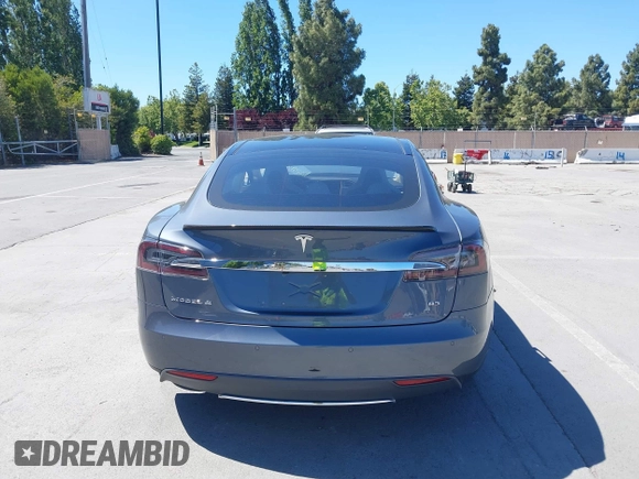 2014 Tesla Model S 60 z VIN 5YJSA1H17EFP33910, wystawiony jako IAAI lot #42346934 z przebiegiem Nie podano mil oraz . Historia ofert i sprzedaży dostępna na DreamBid. Obrazek 16.