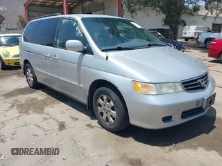 2004 Honda Odyssey EX-L with VIN 5FNRL18774B028164, listed as a IAAI auction lot 42454877 with 135,720 mi miles and . Bid and sale history available at DreamBid. Image 1.