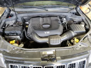 2014 Jeep Grand Cherokee Laredo with VIN 1C4RJFAG2EC329520, listed as a Copart auction lot 47924115 with 177,873 mi miles and Salvage Title. Bid and sale history available at carsss.com. Image 12.