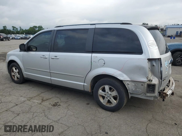 2009 Dodge Grand Caravan SE z VIN 2D8HN44E29R591969, wystawiony jako Copart lot #64255535 z przebiegiem 154 214 mil mil oraz Szkoda całkowita • Salvage title. Historia ofert i sprzedaży dostępna na DreamBid. Obrazek 2.