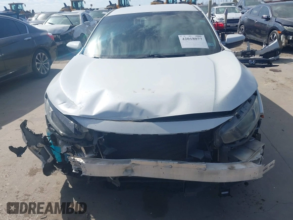 2019 Honda Civic Sport with VIN 19XFC2F81KE024702, listed as a IAAI auction lot 42018077 with 98,613 mi miles and . Bid and sale history available at DreamBid. Image 12.