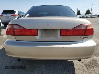 2000 Honda Accord LX z VIN 1HGCG1643YA089899, wystawiony jako Copart lot #54937555 z przebiegiem 196 596 mil mil oraz Szkoda całkowita • Salvage title. Historia ofert i sprzedaży dostępna na DreamBid. Obrazek 6.