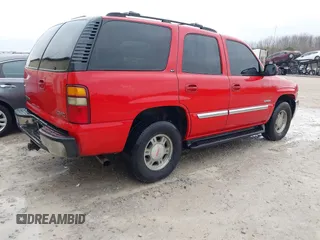 2001 GMC Yukon SLT with VIN 1GKEK13T41J221905, listed as a IAAI auction lot 41512380 with 213,666 mi miles. Bid and sale history available at carsss.com. Image 4.