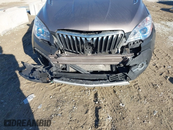 2014 Buick Encore Convenience with VIN KL4CJBSB5EB742534, listed as a IAAI auction lot 41655547 with 63,199 mi miles and . Bid and sale history available at DreamBid. Image 6.