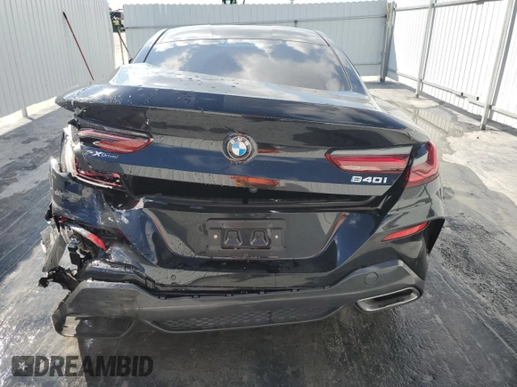 2025 BMW 8 Series 840i with VIN WBAAE4C04SCS91996, listed as a Copart auction lot 43319785 with 7,345 mi miles and Clean Title. Bid and sale history available at DreamBid. Image 6.