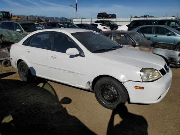 2004 Suzuki Forenza S z VIN KL5JD52Z14K950658, wystawiony jako Copart lot #74824154 z przebiegiem 99 150 mil mil oraz Tytuł czysty. Historia ofert i sprzedaży dostępna na DreamBid. Obrazek 4.