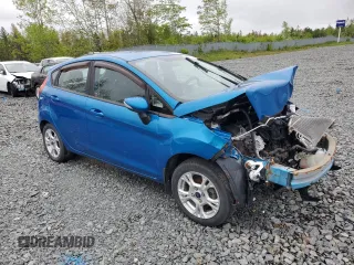 2016 Ford Fiesta SE z VIN 3FADP4EJ4GM155525, wystawiony jako Copart lot #59173285 z przebiegiem Nie podano mil oraz Szkody całkowita. Historia ofert i sprzedaży dostępna na DreamBid. Obrazek 4.