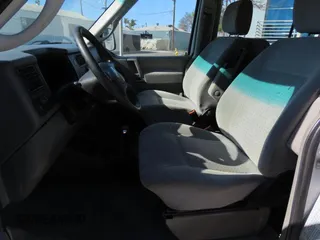 2003 Volkswagen EuroVan MV с VIN WV2NB47003H003033, выставлен на аукционе Copart как лот 59629785 с пробегом 164 173 миль миль и Чистый • Clean title. История ставок и продаж доступна на DreamBid. Изображение 9.