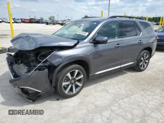 2024 Honda Pilot Touring с VIN 5FNYG1H74RB036990, выставлен на аукционе Copart как лот 56254385 с пробегом Не указан миль и Списание • Salvage title. История ставок и продаж доступна на DreamBid. Изображение 1.