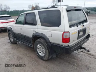 1999 Toyota 4Runner Limited with VIN JT3GN87R7X0105748, listed as a IAAI auction lot 41191084 with 325,053 mi miles and . Bid and sale history available at DreamBid. Image 3.