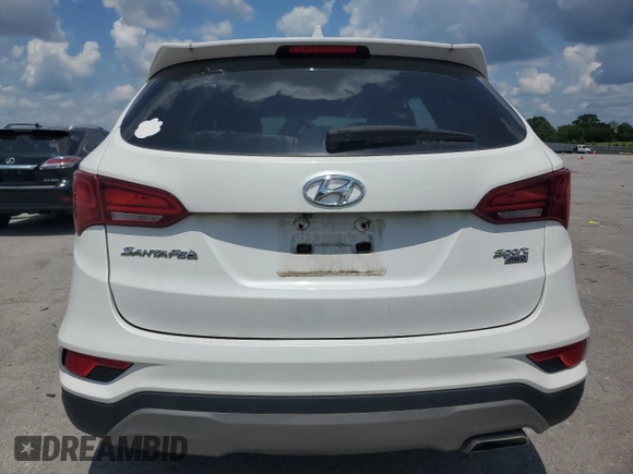 2017 Hyundai Santa Fe 2.4L with VIN 5NMZTDLB0HH000420, listed as a Copart auction lot 65213825 with 121,576 mi miles and Clean title. Bid and sale history available at DreamBid. Image 6.
