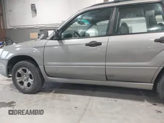 2006 Subaru Forester X with VIN JF1SG63656H700426, listed as a IAAI auction lot 42467619 with 210,918 mi miles and . Bid and sale history available at DreamBid. Image 6.