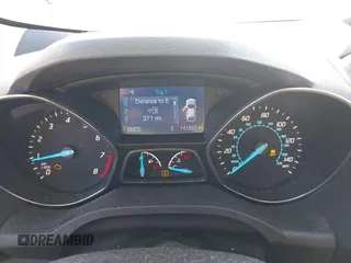 2014 Ford Escape SE with VIN 1FMCU9G9XEUB01861, listed as a IAAI auction lot 42096150 with 141,853 mi miles. Bid and sale history available at carsss.com. Image 7.