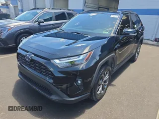 2022 Toyota RAV4 Hybrid XLE Premium z VIN 4T3B6RFVXNU071885, wystawiony jako IAAI lot #42730174 z przebiegiem 53 502 mil mil oraz . Historia ofert i sprzedaży dostępna na DreamBid. Obrazek 18.